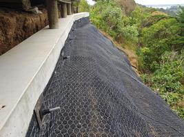 Completed Ground Beam And Soilnailed Slope Following Landslip